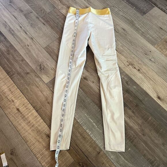 Nike Women's Pro Warm
7/8 Training Tights (Light
Cream/Gold small - Picture 4 of 11